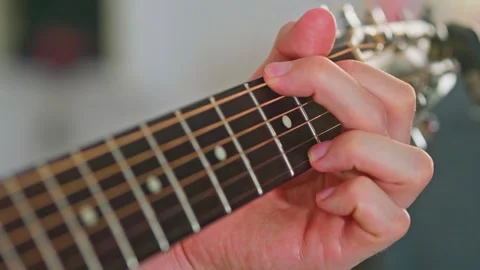 Close-up shot of guitar playing Stock Footage 255128919
