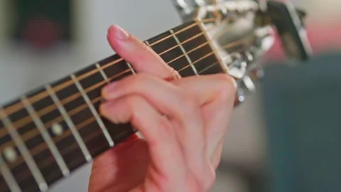 Close-up shot of guitar playing Stock Footage 255129411