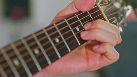 Close-up shot of guitar playing Stock Footage 255147490