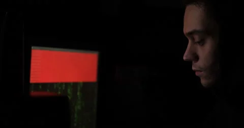 Close-up shot of hacker breaks into the network Stockbeeldmateriaal 142729541