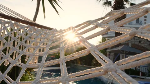 Close up shot of hammock by the pool Stock Footage 247723772