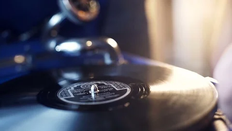 Close up shot on Hand drops the needle onto vinyl record Stock Footage 71500057