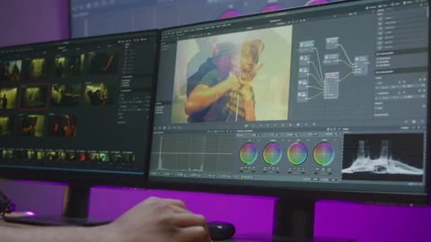 Close up shot of hand of editor using computer mouse Stock Footage 244453149