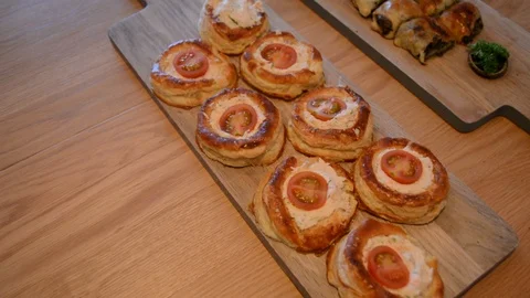 Close shot of hand picking up typical french savoury pastry vol-au-vent Stock Footage 114886286