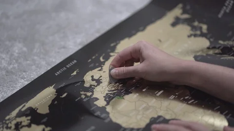 Close shot of hand scratching the Scratch map with tool. Stock Footage 122259535
