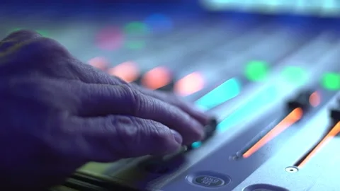 Close up shot of a hand sliding knobs on a lighting console or a DJ deck 스톡 동영상 150565489