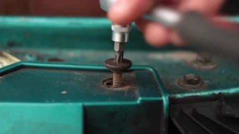 Close-up shot of hand unscrew bolt with wrench Stock Footage 150613634