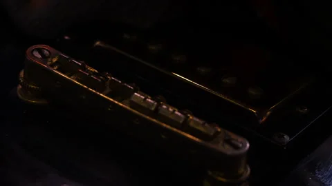 Close up shot the hand using microfiber fabric to clean the fret board Stock Footage 319750323