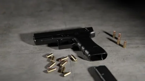 Close up shot of Handgun on the floor Stock Footage 253622719