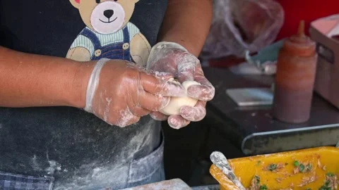Close up shot of handmade authentic Xian Bing meat pie, a stall vendor Stock Footage 274646079