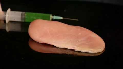 Close shot hands of bio chemistry researcher. Raising the pork meat weight with Stock Footage 80648157