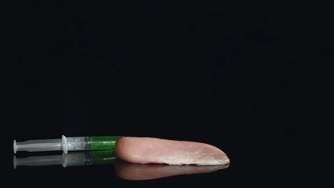 Close shot hands of bio chemistry researcher. Raising the pork meat weight with Stock Footage 80648249