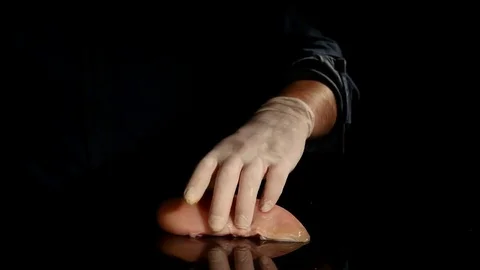 Close shot hands of bio chemistry researcher. Raising the pork meat weight with Stock Footage 80648280