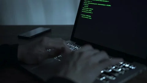 Close-up shot of hands of Computer programmer making a new program Using Stock-Footage 334586749