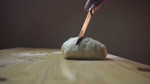 Close-up shot of hands cutting flour into dough Stock Footage 271147946