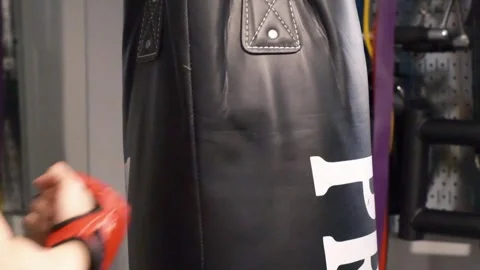 Up close shot of hands hitting a punching bag Portland OR USA June 20th 2025 Stock Footage 311678729