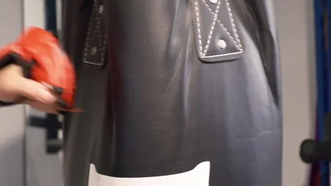 Up close shot of hands hitting a punching bag Portland OR USA June 20th 2025 Stock-Footage 311678739