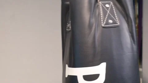 Up close shot of hands hitting a punching bag Portland OR USA June 20th 2025 Stock-Footage 311678755
