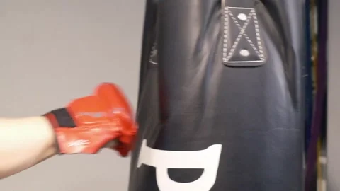 Up close shot of hands hitting a punching bag Portland OR USA June 20th 2025 Stock-Footage 311678763