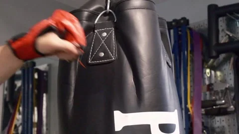 Up close shot of hands hitting a punching bag Portland OR USA June 20th 2025 Stock-Footage 311678768