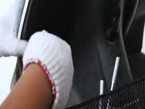 Close up shot hands of man using screwdriver for remove motorcycle part 001 Stock Footage 76183819