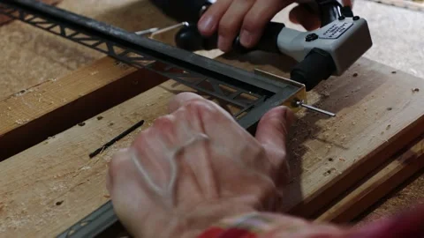 Close up shot on hands with rivet gun. Stock Footage 140724177