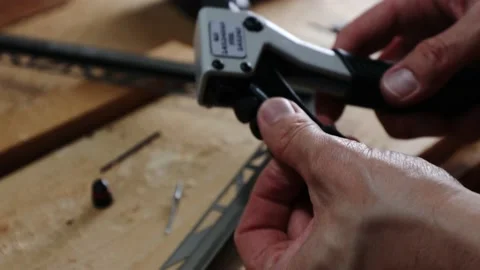 Close up shot on hands with rivet gun. Video stock 140724457
