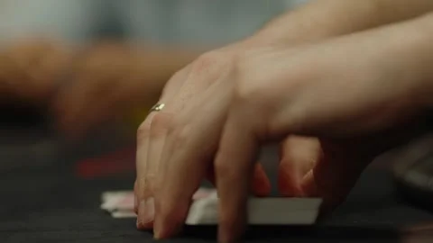 Close-up shot of hands shuffling a deck of cards Stock Footage 336239533