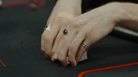 Close-up shot of hands shuffling a deck of cards Stock Footage 336240503