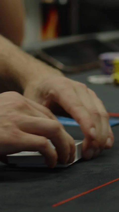 Close-up shot of hands shuffling a deck of cards Stock Footage 336261074
