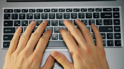 Close up shot of hands typing on computer keyboard, business man working on Stock Footage 120300229