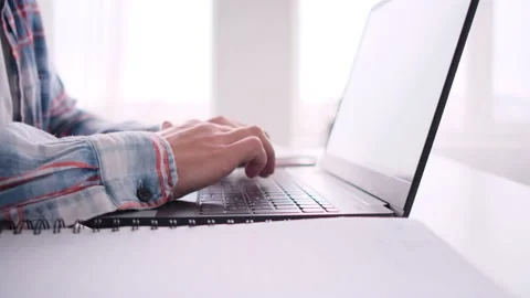 Close-up shot of hands typing on laptop computer at the desk Stock Footage 171542329