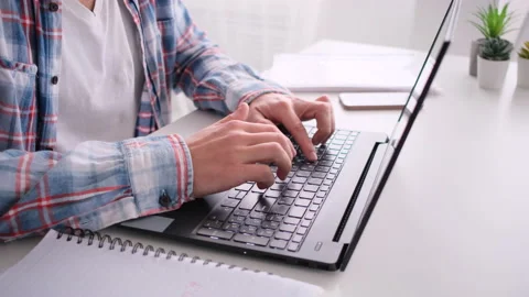 Close-up shot of hands typing on laptop computer at the desk Video stock 171544193