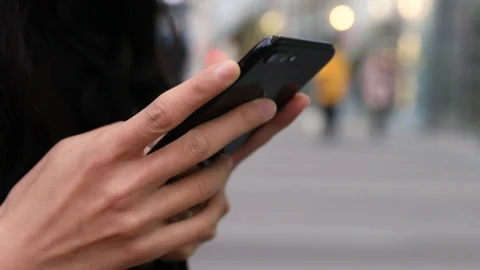 Close-up shot of hands using mobile phone Vídeo Stock 104399882