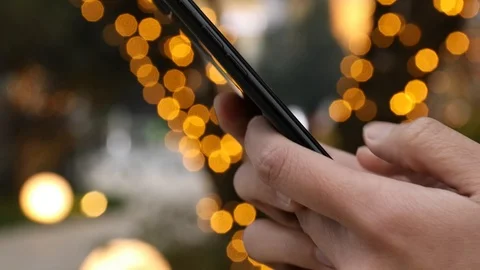 Close-up shot of hands using mobile phone 스톡 동영상 104400738