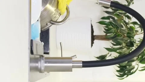 Close-up shot of hands washing pans in a restaurant kitchen. Dishwashing concept Stock Footage 250354621