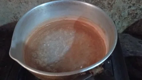 A close-up shot from a high angle showing boiling water. Stock Footage 321937638
