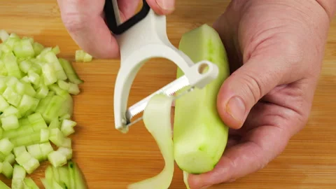 This close up shot highlights the sliced ingredients ready for a salad. Video stock 341546749