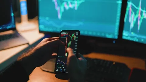 With a close-up shot of his hands typing away on a smartphone screen and using a Stock Footage 274118123