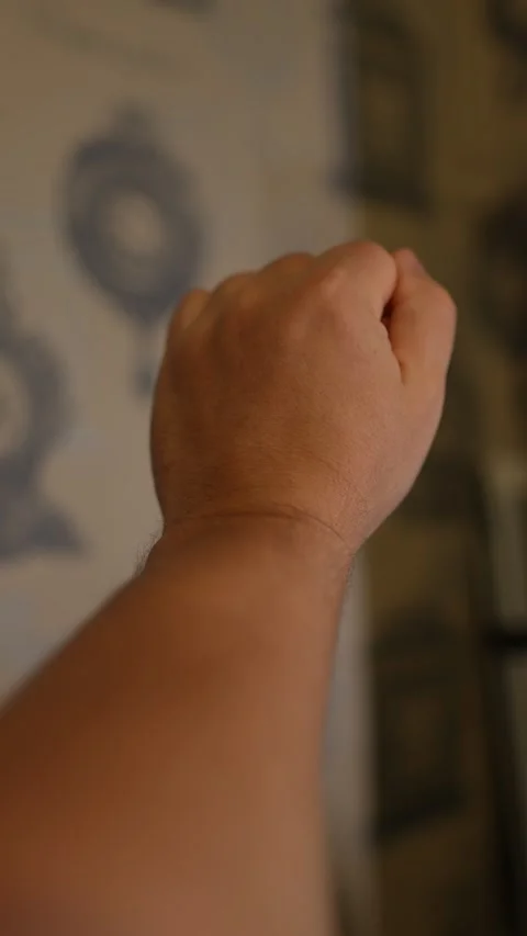 A close-up shot of a human hand held out with the palm Stock Footage 328650898