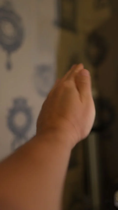 A close-up shot of a human hand held out with Stock Footage 328651007