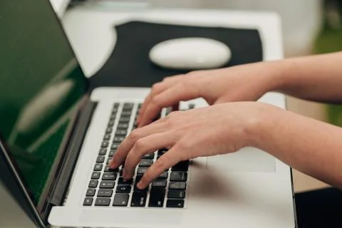 Close-Up Shot of Human Hands Placed Over Laptop Stock Photos