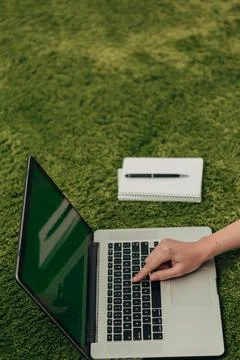 Close-Up Shot of Human Hands Placed Over Laptop Stock Photos