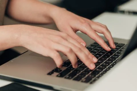 Close-Up Shot of Human Hands Placed Over Laptop Stock Photos