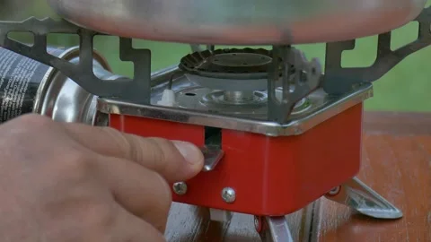 Close-up shot igniting or burning camping gas stove Stock Footage 132310119