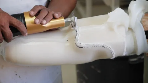 Close up shot of Indonesian man making prosthetic device, Bali Stock Footage 140263252