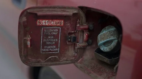 Close up shot of insertion of the nozzle Stock Footage 71099624