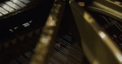 Close-up shot of the interior of a Steinway and sons piano/ Piano strings Video stock 138401547