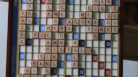 Close-up shot of interlocking wooden letter tiles. Stock Footage 338189483