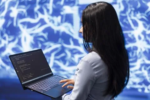 Close up shot of IT expert using AI system and laptop Stock Photos